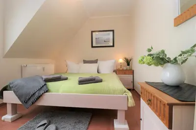 Ein Bett oder Betten in einem Zimmer der Unterkunft 