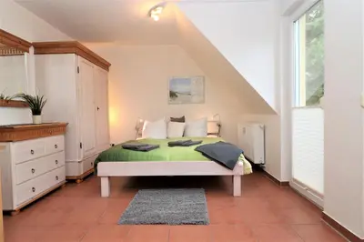 Ein Bett oder Betten in einem Zimmer der Unterkunft 