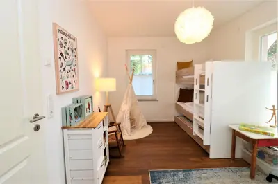 Ein Bett oder Betten in einem Zimmer der Unterkunft Sonnenseite App 09