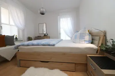 Ein Bett oder Betten in einem Zimmer der Unterkunft Sonnenseite App 23
