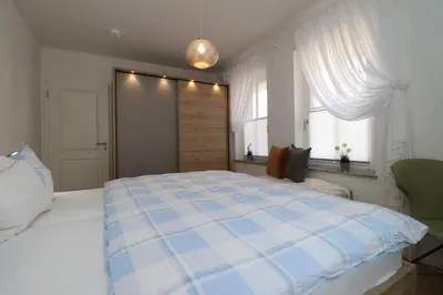 Ein Bett oder Betten in einem Zimmer der Unterkunft Sonnenseite App 23