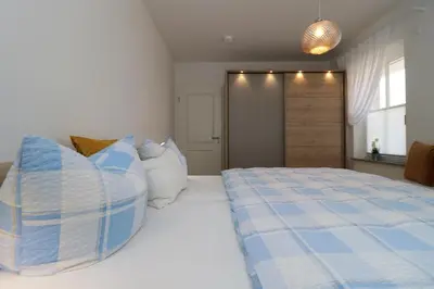 Ein Bett oder Betten in einem Zimmer der Unterkunft Sonnenseite App 23