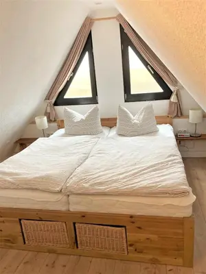 Ein Bett oder Betten in einem Zimmer der Unterkunft Töpferweg 06 Doppelhaushälfte Mia