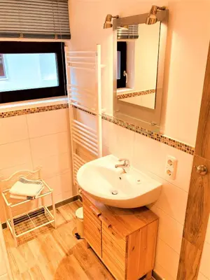 Ein Badezimmer in der Unterkunft Töpferweg 06 Doppelhaushälfte Mia