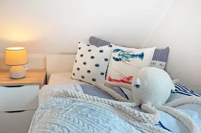 Ein Bett oder Betten in einem Zimmer der Unterkunft Mondzauber