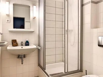 Ein Badezimmer in der Unterkunft Residenz Kormoran, Windspiel