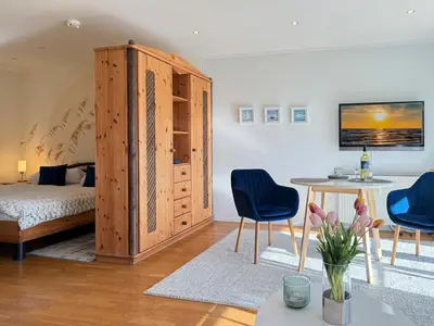 Ein Bett oder Betten in einem Zimmer der Unterkunft In den Wiesen App 2