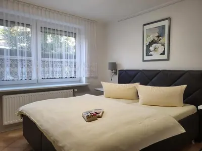 Ein Bett oder Betten in einem Zimmer der Unterkunft Anikas Ferienwohnung 2
