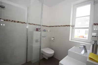 Ein Badezimmer in der Unterkunft Appartement Louise