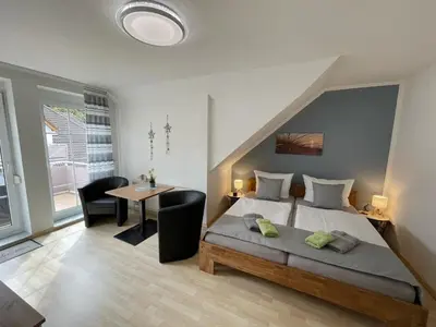 Ein Bett oder Betten in einem Zimmer der Unterkunft Ferienwohnung Kleine Brise