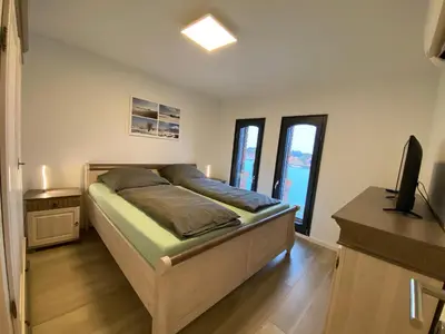 Ein Bett oder Betten in einem Zimmer der Unterkunft Fewo Sonnenblick
