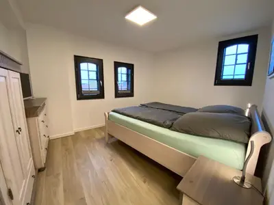 Ein Bett oder Betten in einem Zimmer der Unterkunft Fewo Sonnenblick