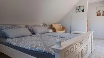 Ein Bett oder Betten in einem Zimmer der Unterkunft Bei Ziegers Ferienhaus
