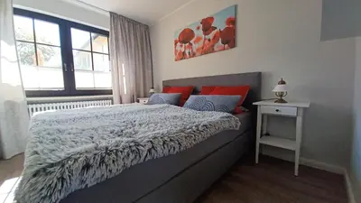 Ein Bett oder Betten in einem Zimmer der Unterkunft Bei Ziegers Ferienwohnung EG