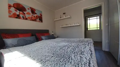 Ein Bett oder Betten in einem Zimmer der Unterkunft Bei Ziegers Ferienwohnung EG