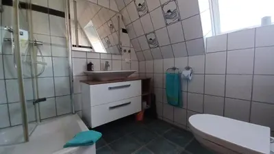 Ein Badezimmer in der Unterkunft Bei Ziegers Ferienwohnung OG