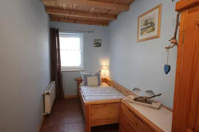 Ein Bett oder Betten in einem Zimmer der Unterkunft Blue Water 1