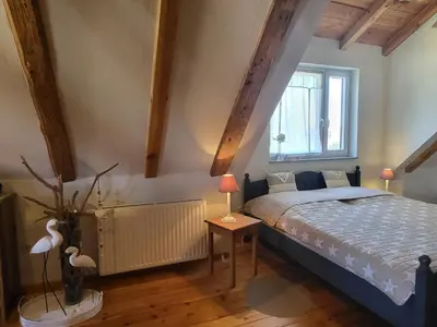 Ein Bett oder Betten in einem Zimmer der Unterkunft Blue Water 2