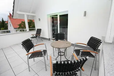 Ein Sitzbereich in der Unterkunft Ferienwohnung Christl