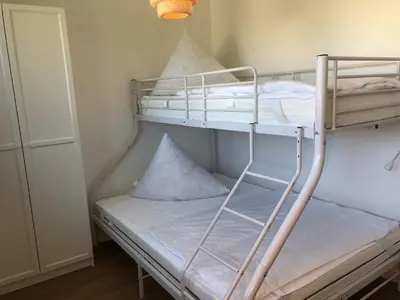 Ein Bett oder Betten in einem Zimmer der Unterkunft Zur Oie 27