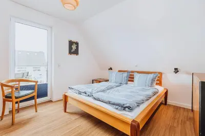 Ein Bett oder Betten in einem Zimmer der Unterkunft Zur Oie 27