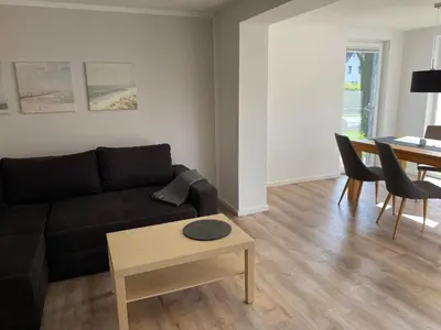 Ein Sitzbereich in der Unterkunft Strandveranda