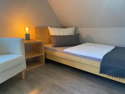 Ein Bett oder Betten in einem Zimmer der Unterkunft Ferienhaus Buhne 31