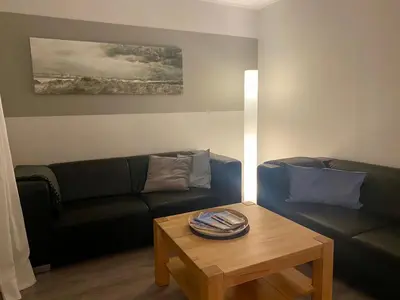 Ein Sitzbereich in der Unterkunft Ferienhaus Buhne 31