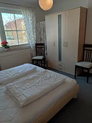Ein Bett oder Betten in einem Zimmer der Unterkunft Martha-Müller-Grählert-Weg 7 8 Wg 8