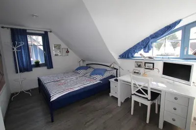 Ein Bett oder Betten in einem Zimmer der Unterkunft UniKate