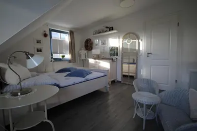 Ein Bett oder Betten in einem Zimmer der Unterkunft UniKate