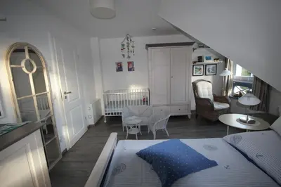 Ein Bett oder Betten in einem Zimmer der Unterkunft UniKate