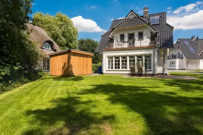 Ein Garten an der Unterkunft Am Lütten Bagen Haus Attila