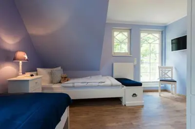 Ein Bett oder Betten in einem Zimmer der Unterkunft Am Lütten Bagen Haus Attila