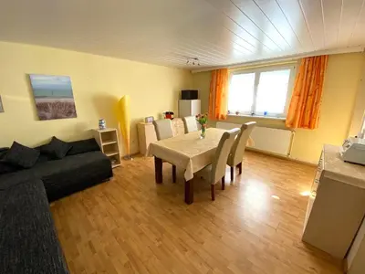 Ein Sitzbereich in der Unterkunft Bungalow mit Pool