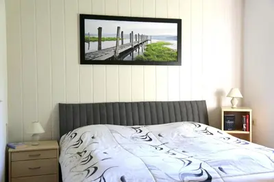 Ein Bett oder Betten in einem Zimmer der Unterkunft Bungalow mit Pool