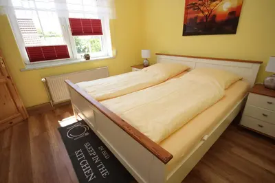Ein Bett oder Betten in einem Zimmer der Unterkunft Ferienwohnung Leitzsch