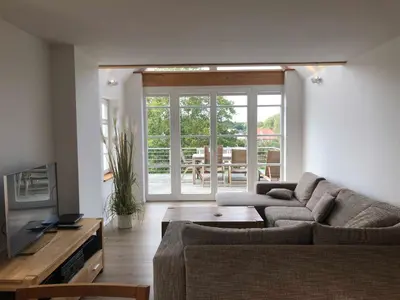 Ein Sitzbereich in der Unterkunft Ferienwohnung im Kapitänshaus