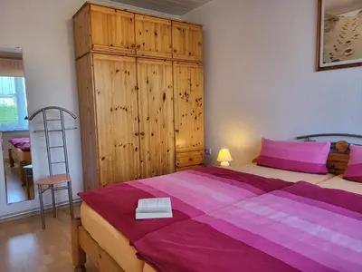 Ein Bett oder Betten in einem Zimmer der Unterkunft Ferienhaus Moeller