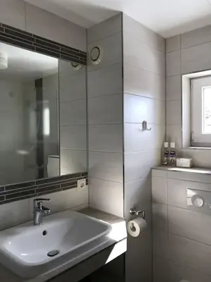Ein Badezimmer in der Unterkunft Charmantes lütt Eckhus Zingst