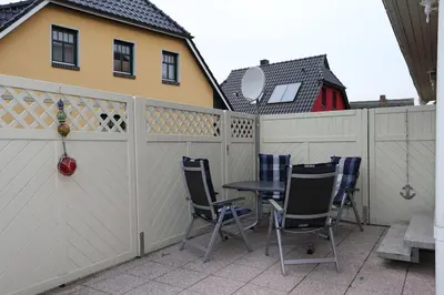 Ein Balkon oder eine Terrasse in der Unterkunft Charmantes lütt Eckhus Zingst