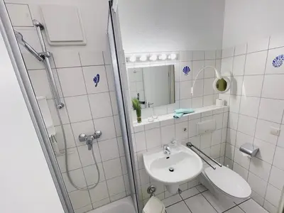 Ein Badezimmer in der Unterkunft Ferienwohnung Stranddüne 117