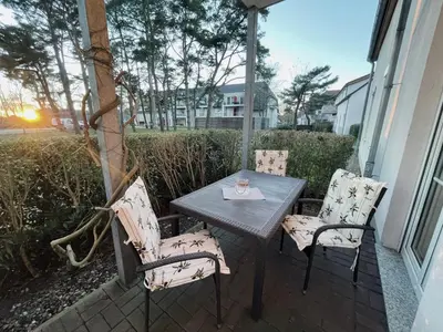 Ein Sitzbereich in der Unterkunft Ferienwohnung Stranddüne 117
