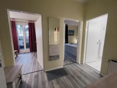 Ein Bett oder Betten in einem Zimmer der Unterkunft Ferienwohnung Stranddüne 117