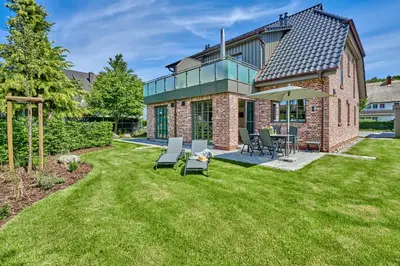 Ein Garten an der Unterkunft FeWo Brede Zingst