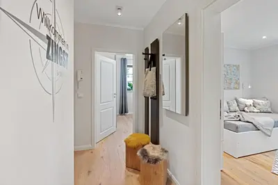 Ein Bett oder Betten in einem Zimmer der Unterkunft FeWo Brede Zingst