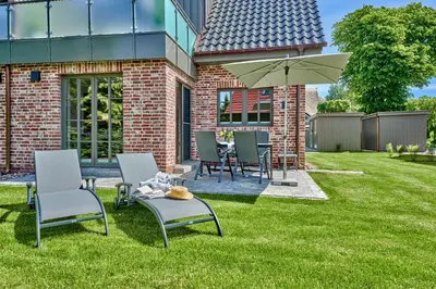Ein Garten an der Unterkunft FeWo Brede Zingst