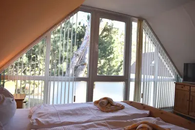 Ein Bett oder Betten in einem Zimmer der Unterkunft Hinter den Dünen D77