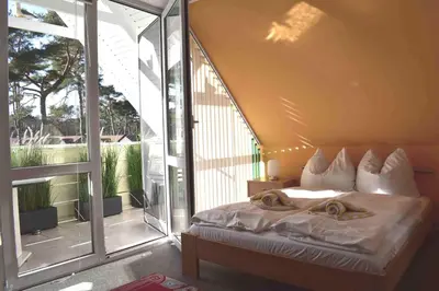 Ein Bett oder Betten in einem Zimmer der Unterkunft Hinter den Dünen D77