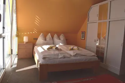 Ein Bett oder Betten in einem Zimmer der Unterkunft Hinter den Dünen D77